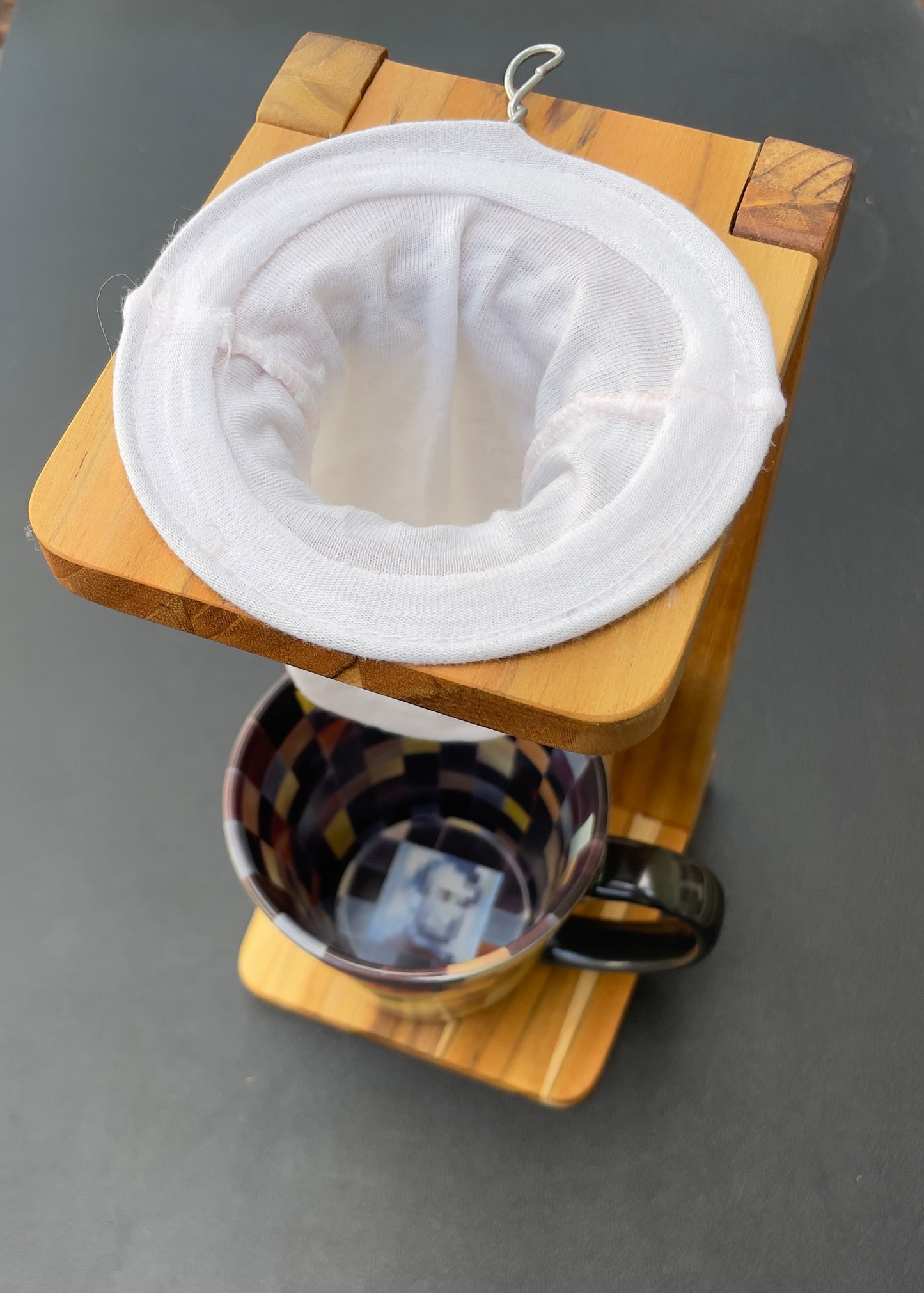 Chorreador with cloth coffee filter and cup